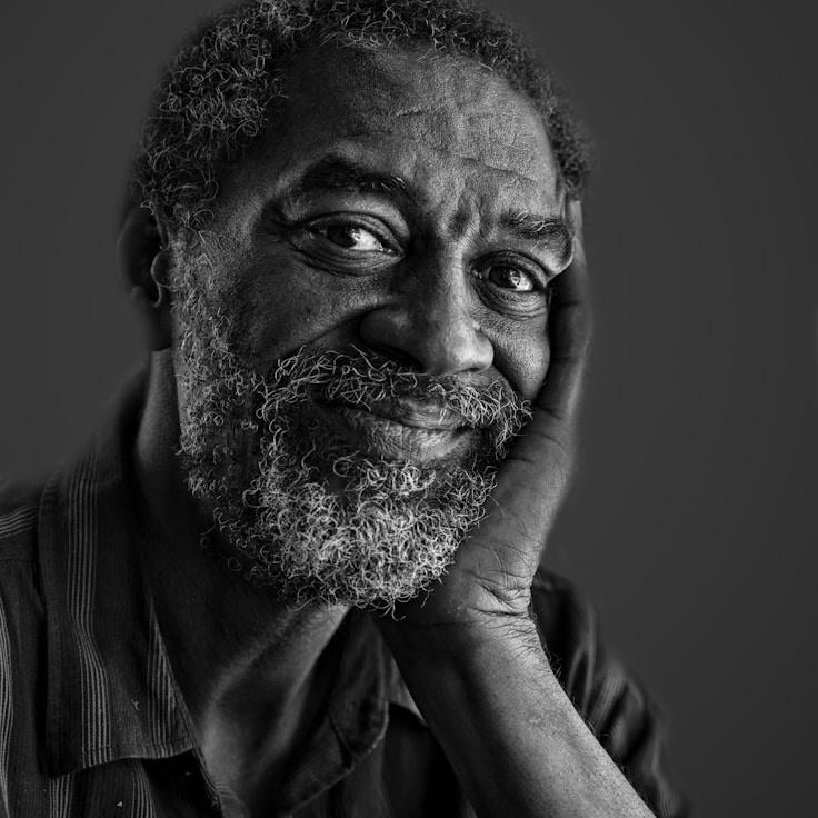 Avery Chen, Lead Design Curator at HarborPulseGrove, reviewing corporate floral arrangements